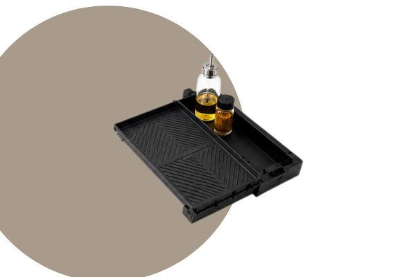 a grill mat with bottles on it