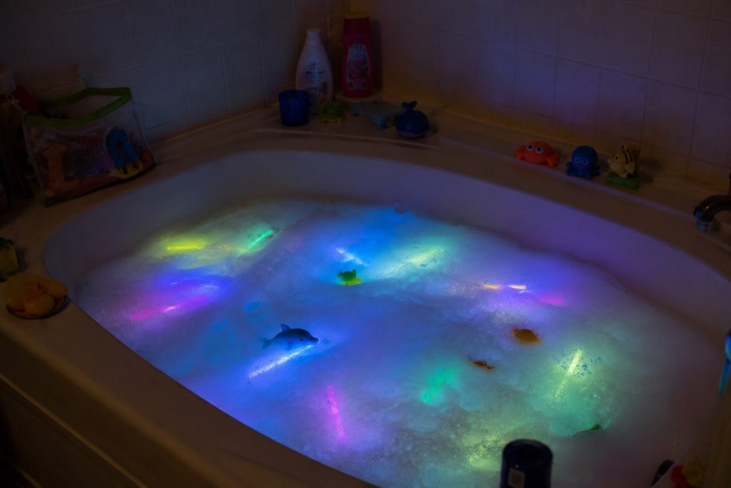 a bubble bath with glow sticks